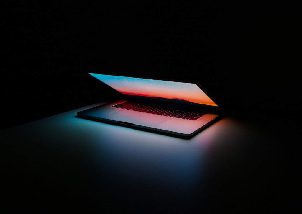 Table illuminated by computer screen