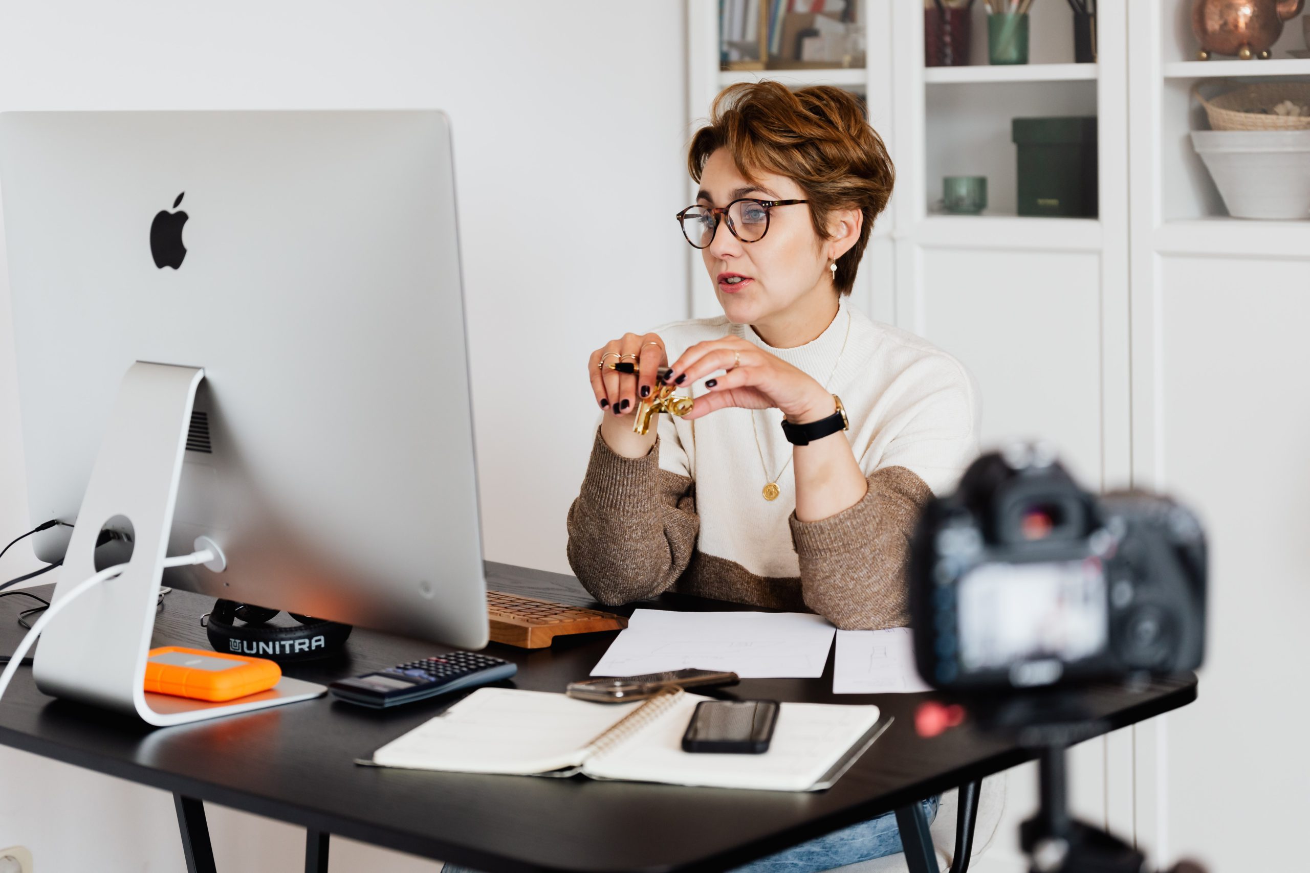 woman sitting in front of computer